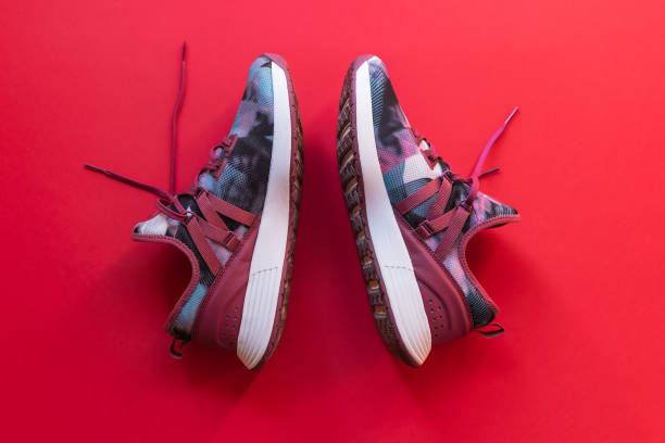 istock Sneakers on the red background 1223676772