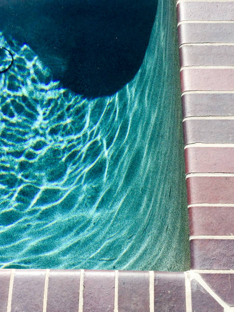 istock Swimmimg pool aqua blue water wave reflections 1223677922