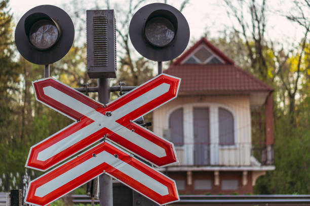 Empty railway tracks with railroad switch seen from above. The railway tracks create an almost abstract line pattern from this high viewpoint.