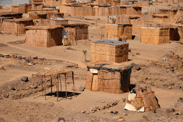 In Karas Region, Namibia near the mountains is a rural village of simple residential housing structures placed in a community near the road.