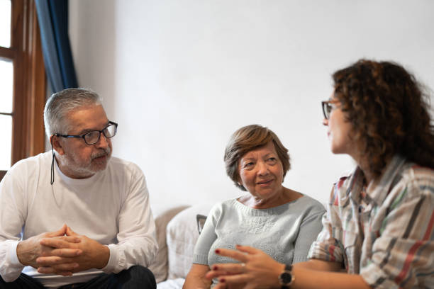 Family discussing in living room