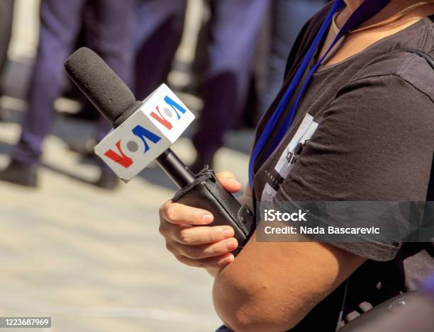 The Voa Microphone On Woman Hand Interview Concept Stock Photo - Download Image Now
