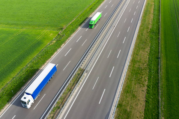 istock Trucks on Rural Highway, Aerial View 1223692354