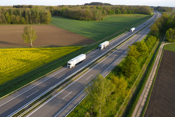 istock Trucks Speeding on Rural Highway 1223693224