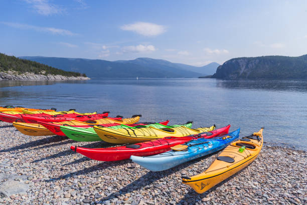 Kayaks on the beach, Birchy Head, Gros Morne National Park, Newfoundland and Labrador, Canada Kayaks on the beach, Birchy Head, Gros Morne National Park, Newfoundland and Labrador, Canada newfoundland & labrador stock pictures, royalty-free photos & images