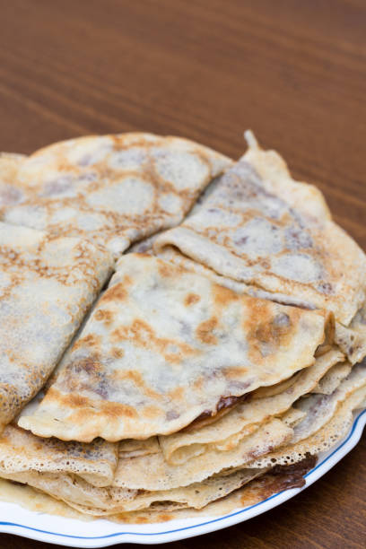 istock Fried pancakes with chocolate cream served on the plate 1223693789