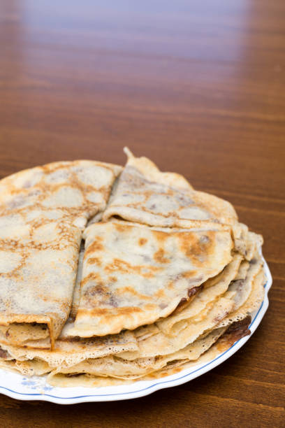 istock Fried pancakes with chocolate cream served on the plate 1223693800