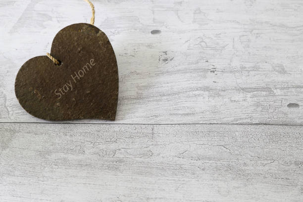 istock heart shaped terracotta in a wooden background 1223698921