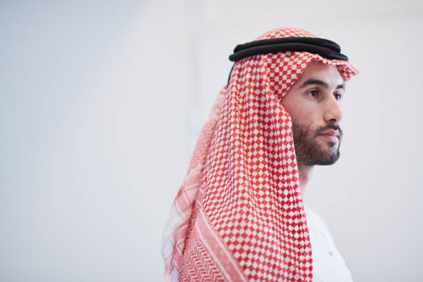 istock young arabian businessman using smartphone at home 1223702110