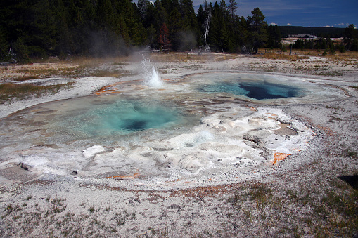 Boiling water in crystal clear basins in Yellowstone