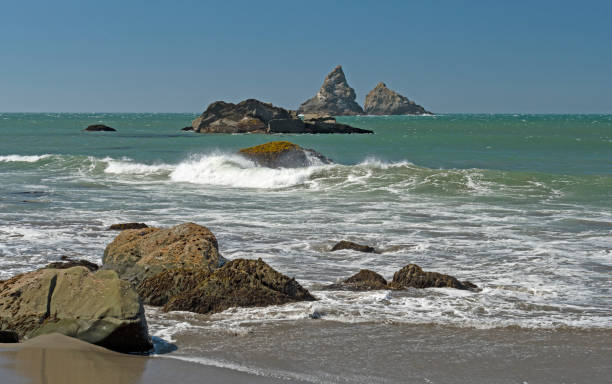 istock Crashing Waves on Coastal Sea Stacks 1223712716
