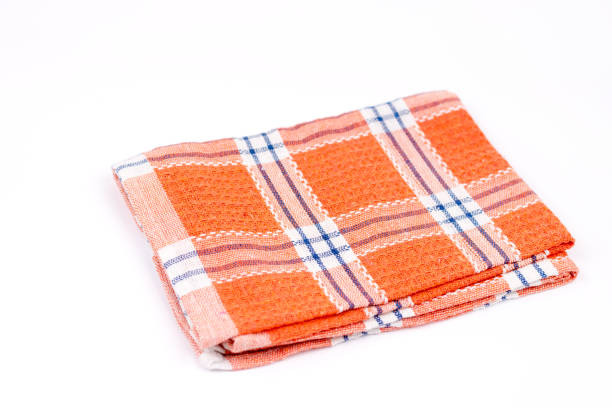 istock Orange brand new kitchen dishtowel over white background 1223722244