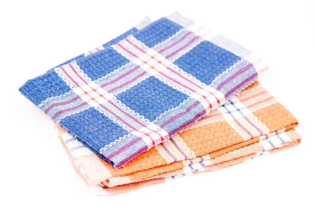 istock Blue and orange new kitchen dishtowels over white background 1223723279
