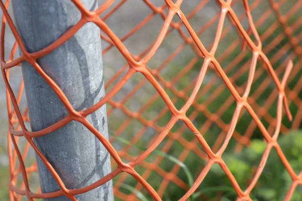 istock Orange Barrier and Metal Post 1223727948