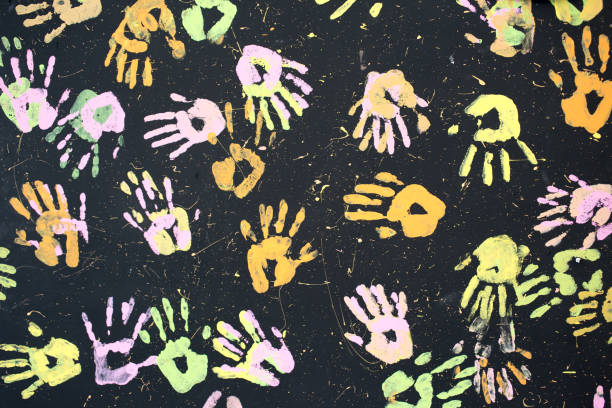 istock Colorful hand painting on black background. 1223727949