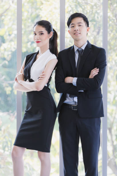 istock Asian business people posing in office. 1223728589