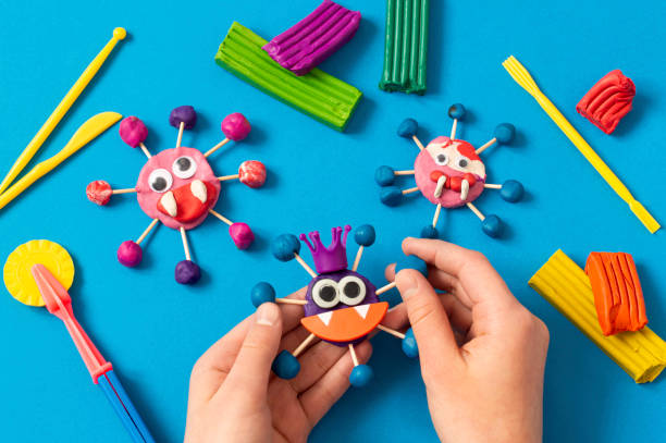 istock Child makes scary plasticine coronaviruses 1223730458