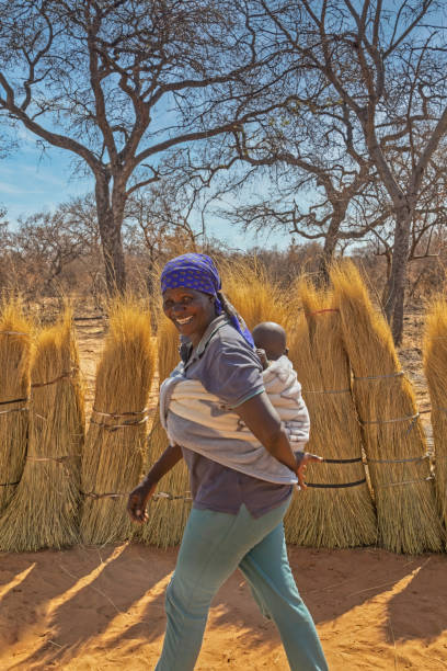 istock African mother carry child 1223731114