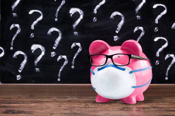 istock Piggy Bank In Face Mask 1223737259