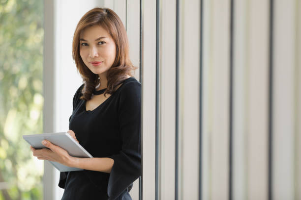istock Lady in black dress 1223740987