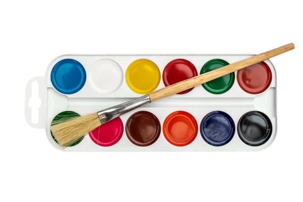 istock Watercolor paints with brush on white. Top view. 1223741686
