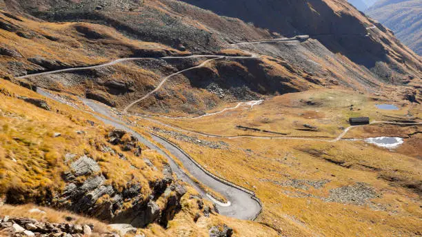Photo of Road to the Gavia mountain pass in Italy. View of the mountain bends creating beautiful shapes