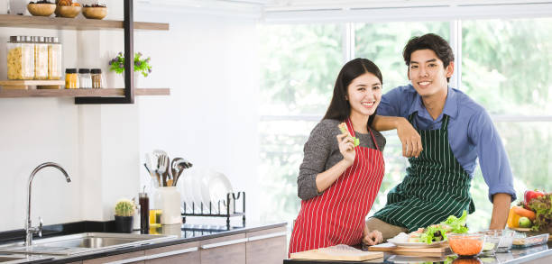 asian couple, man put his hand on woman shoulder. - gourmet enjoyment food freshness imagens e fotografias de stock