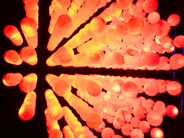istock rows of small globe light yellow and red color ; bottom up view 1223756282