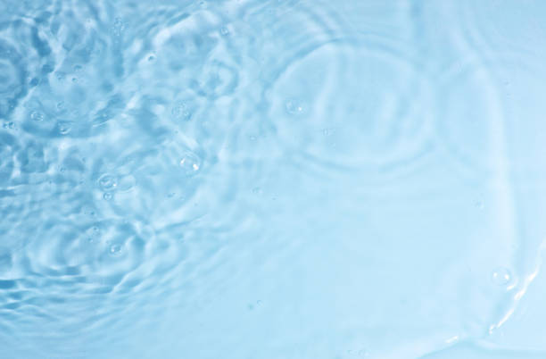 istock texture of splashing clean water on pastel background 1223757236