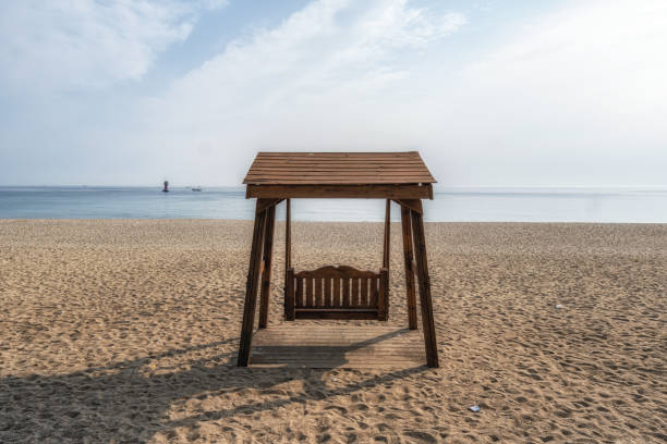 istock Gyeongpodae beach bench swings 1223757317