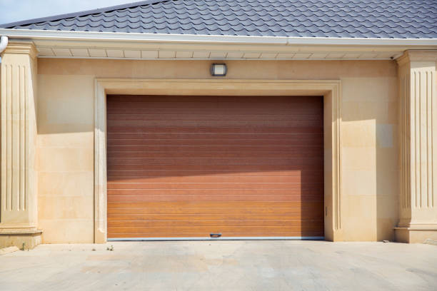 istock Shutter door or roller door and concrete floor outside .White Automatic shutters in a house . gates in the garage . Automatic Electric Roll-up Gate Or Push-up Door In The Modern Building Ground Floor . 1223759713