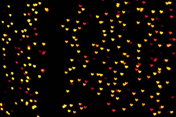 istock Golden colored heart bokeh festive glitter background 1223762218