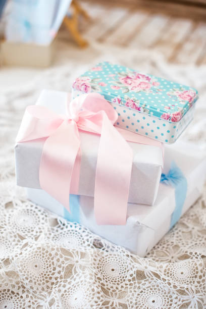 istock Three gift boxes in bright pastel colors. Holiday atmosphere 1223765224