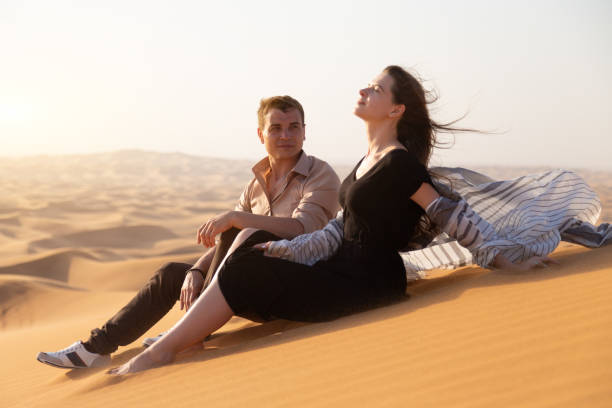 istock Newlyweds on a honeymoon in the desert. 1223773093