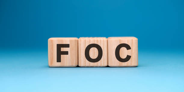 istock FOC word cube on a blue background. Business concept. 1223773980