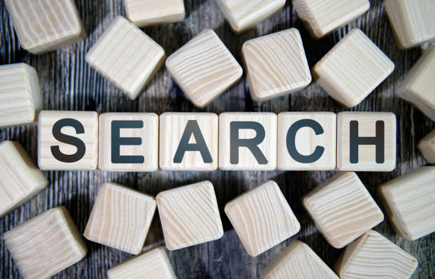 istock Search - text concept seo on a wooden background surrounded by cubes 1223773991