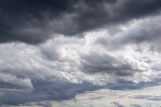istock stormy clouds in the sky. Texture of bright blue dramatic cloudy sky. 1223778956