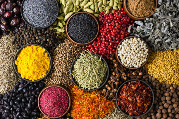 istock Indian spices and herbs as background for packing labels with food. 1223779032