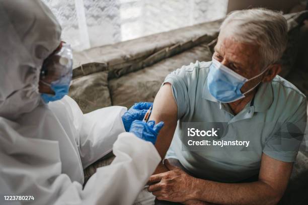 Injection Stock Photo - Download Image Now - Vaccination, Coronavirus, Senior Adult