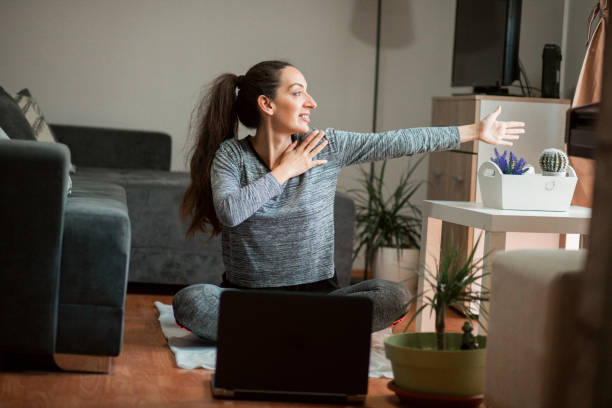 istock Woman working out at home 1223785097