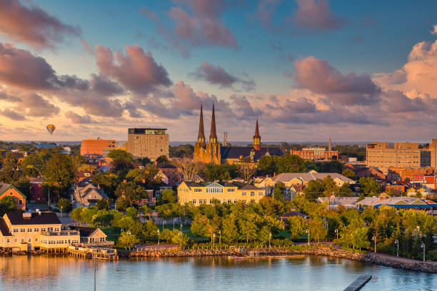Charlottetown Churches at Dusk View of Charlottetown, Prince Edward Island, Canada from the sea prince edward island stock pictures, royalty-free photos & images