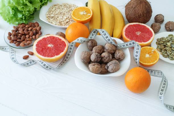 istock Various diet products on white wooden table with space for text 1223793395