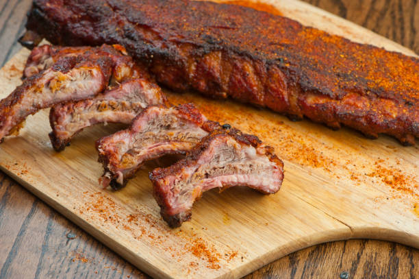 istock Barbecue. Picnic BBQ table spread. Beef brisket, chicken, pork ribs, beef ribs, Mac n cheese, cornbread, Brussels sprouts, coleslaw, and beer. Classic traditional Texas bbq meats and side dishes. 1223797908
