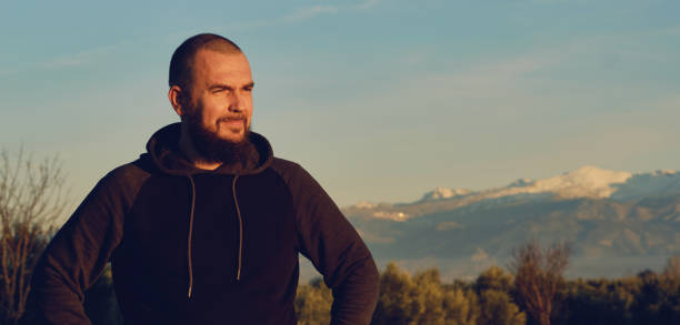 istock Man pose against Sierra Nevada mountains background. Spain 1223799205