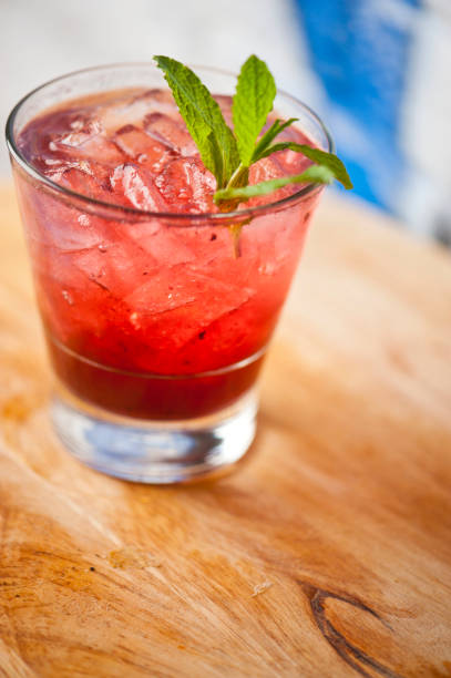 istock Cocktails. Alcoholic Drinks made with gin, vodka, rum or whiskey mixed with soda water, fruit juices and garnishes with limes and cherries. Classic American bar drinks. 1223800159