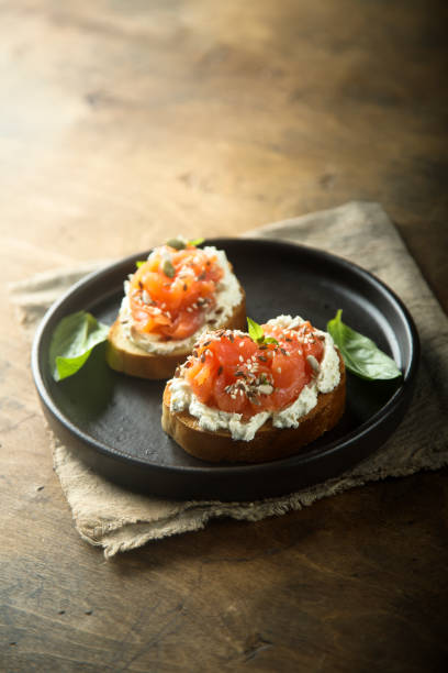 istock Smoked salmon on toast 1223803998