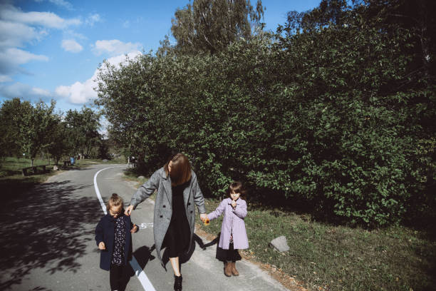 istock family autumn walk 1223809461