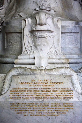 Europe. France. Seine et Marne. Meaux. 03/26/2013. This colorful image depicts the monument to Jacques-Bénigne Bossuet (1627-1704), bishop of Meaux from 1681 to 1704, by Ernest Henri Dubois (1863-1930), placed in Meaux cathedral in 1911. Saint-Etienne cathedral in Meaux .