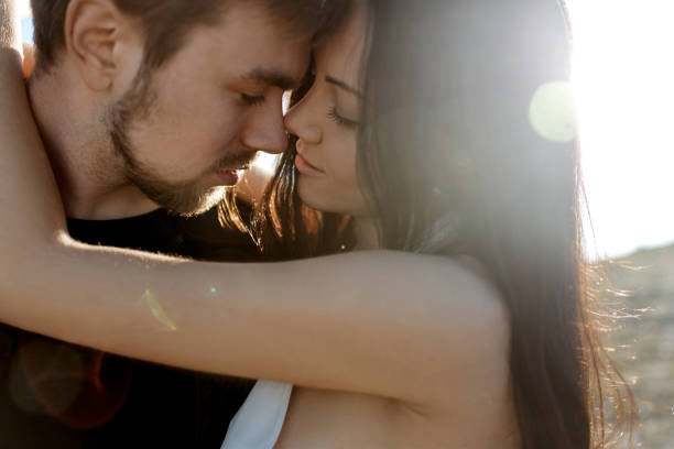 istock Bride and Groom hug each other face to face. 1223814245