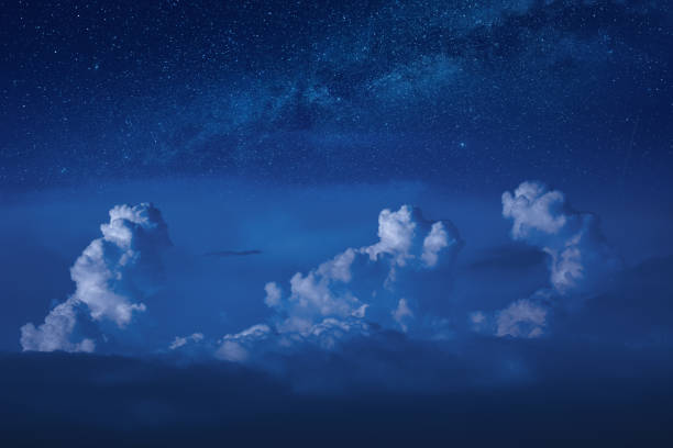 istock Rainy clouds in a moonlight under the milky way 1223816255